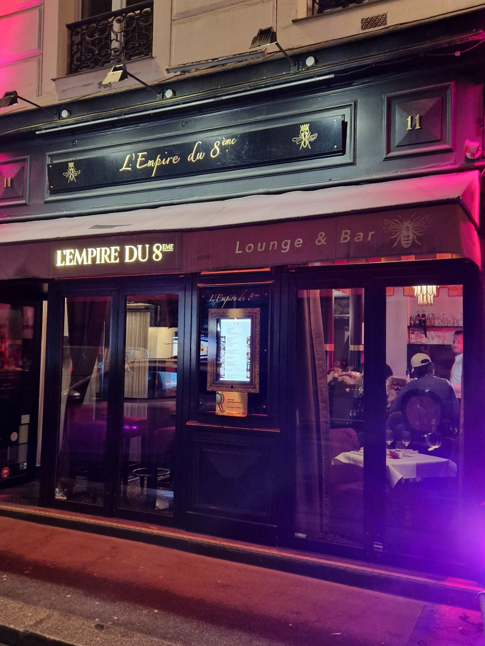 A bar with a television
Description automatically generated